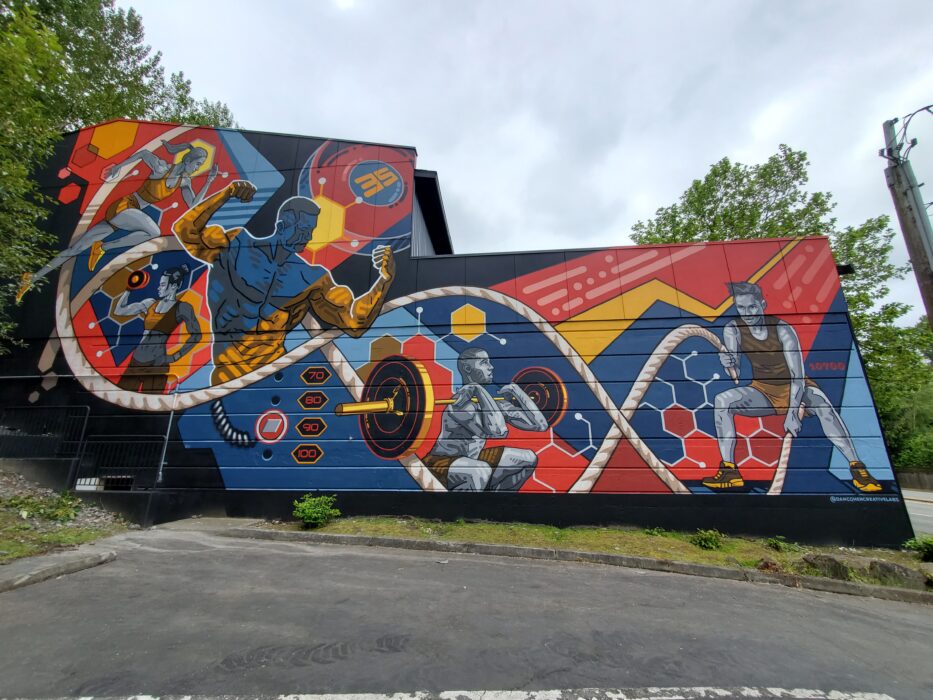 Fitness Compound Mural is a large scale painting painted on a fitness center in Bothell WA