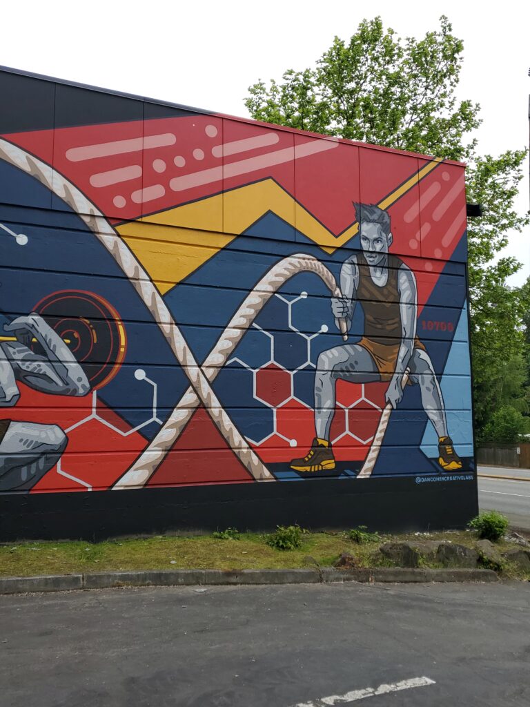 Fitness Compound Mural is a large scale painting painted on a fitness center in Bothell WA